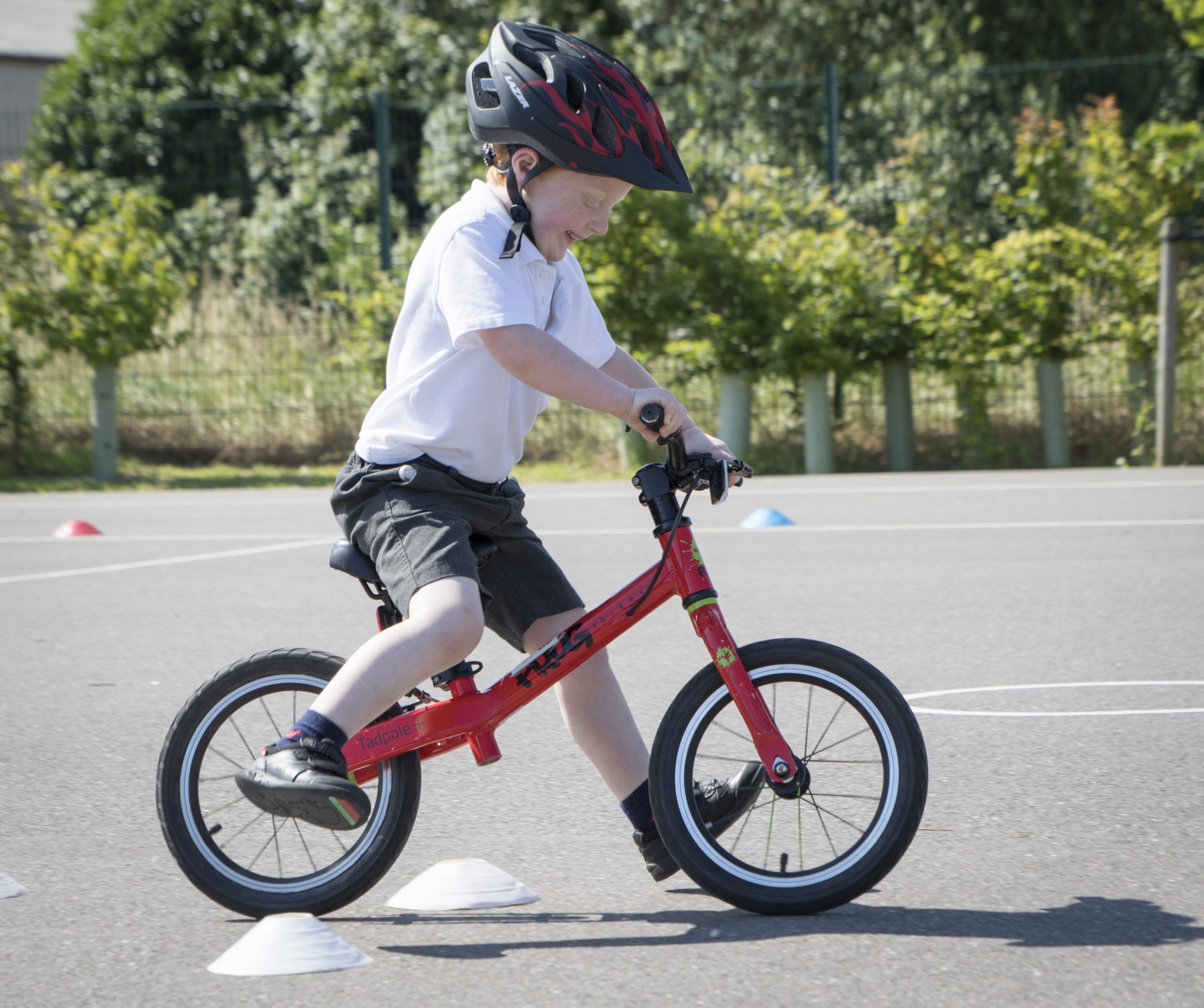 Child doing Bikeability training on a Frog bike