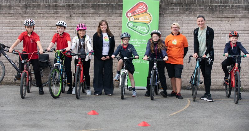 Children taking part in Bikeability session with Dame Sarah Storey and Emily Cherry