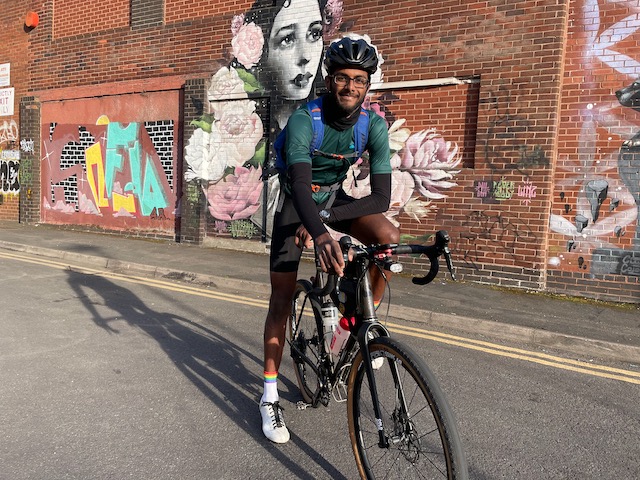 Varun on his bicycle smiling