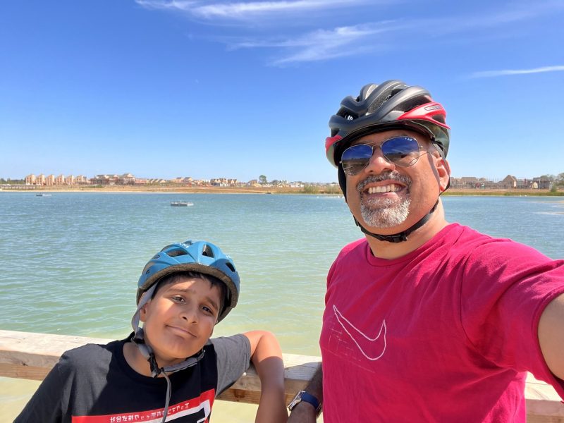 Hartej and his Dad smiling