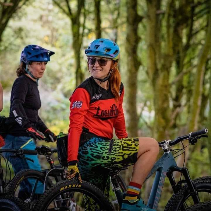 Emma on her bicycle in the woods