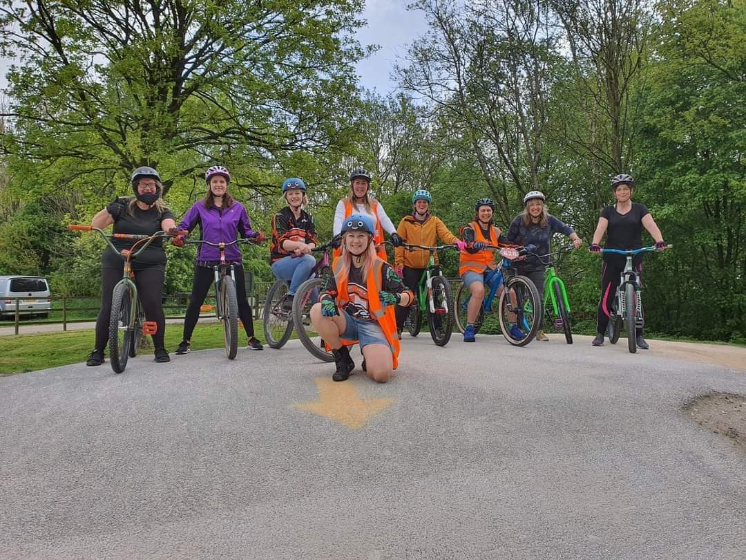 Emma and a group of cyclists lined up on their bicycles
