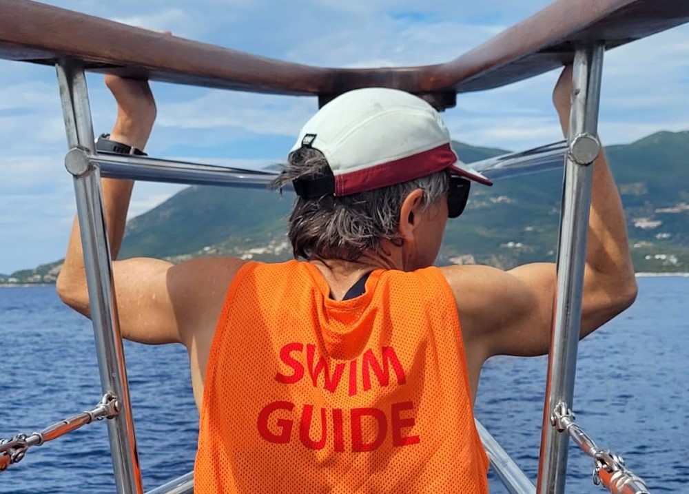 Nicky wearing a swim guide t shirt